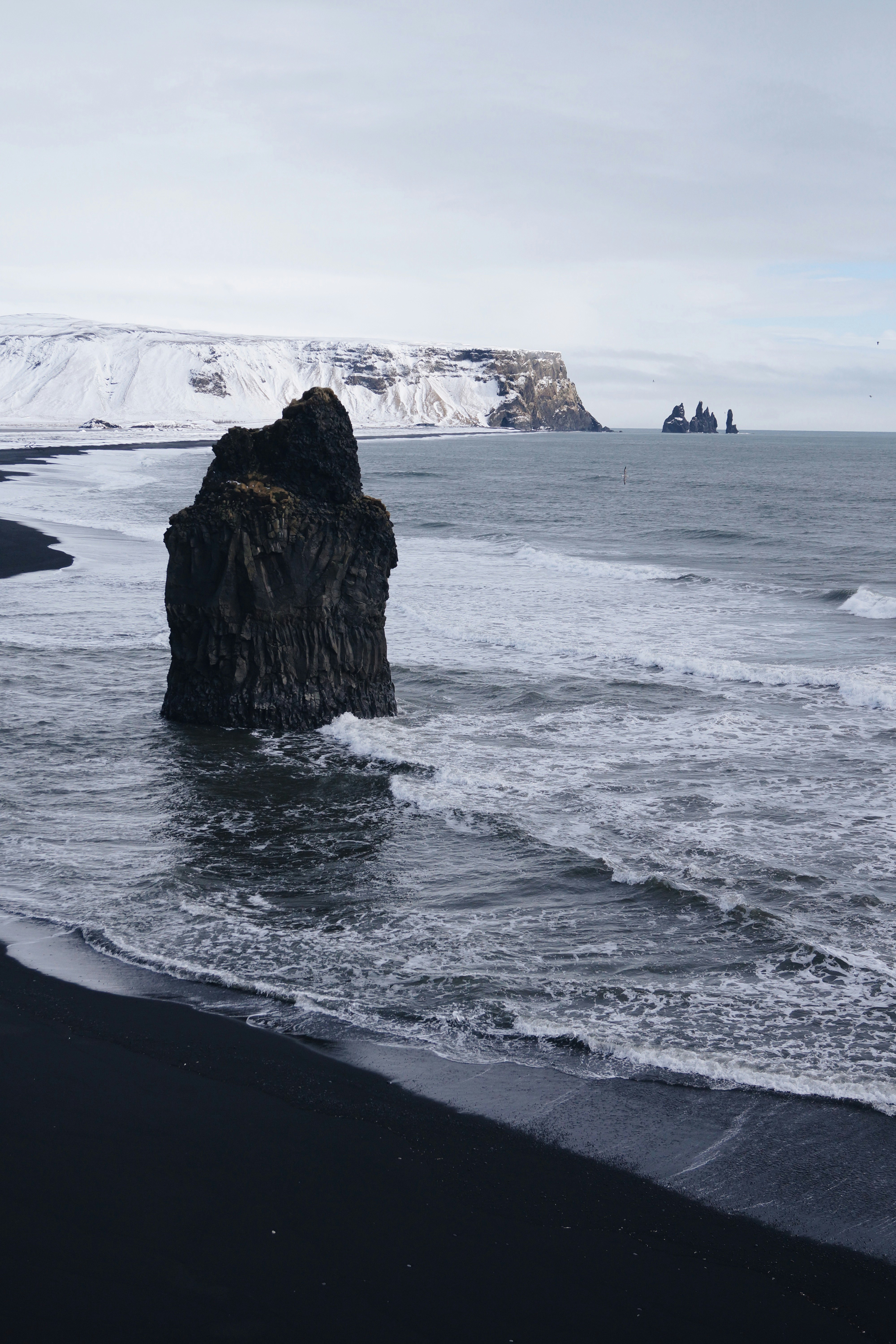 gray rock formation on seashore